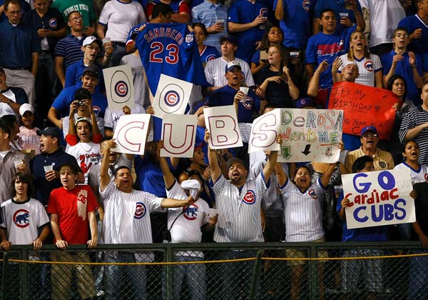 The Troubles of Cub Fans - Chicago Cub fans display signage